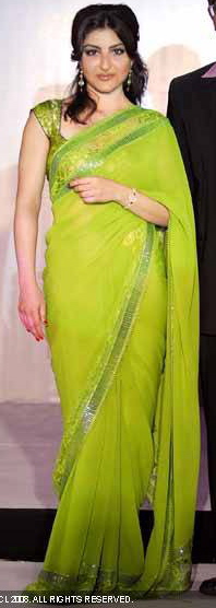 soha-ali-khan-green-sari-launch-of-titans-raga-diva.jpg