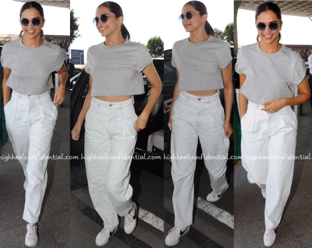 Deepika Padukone's Airport Look In A Green Pant Suit And Micro Sunglasses